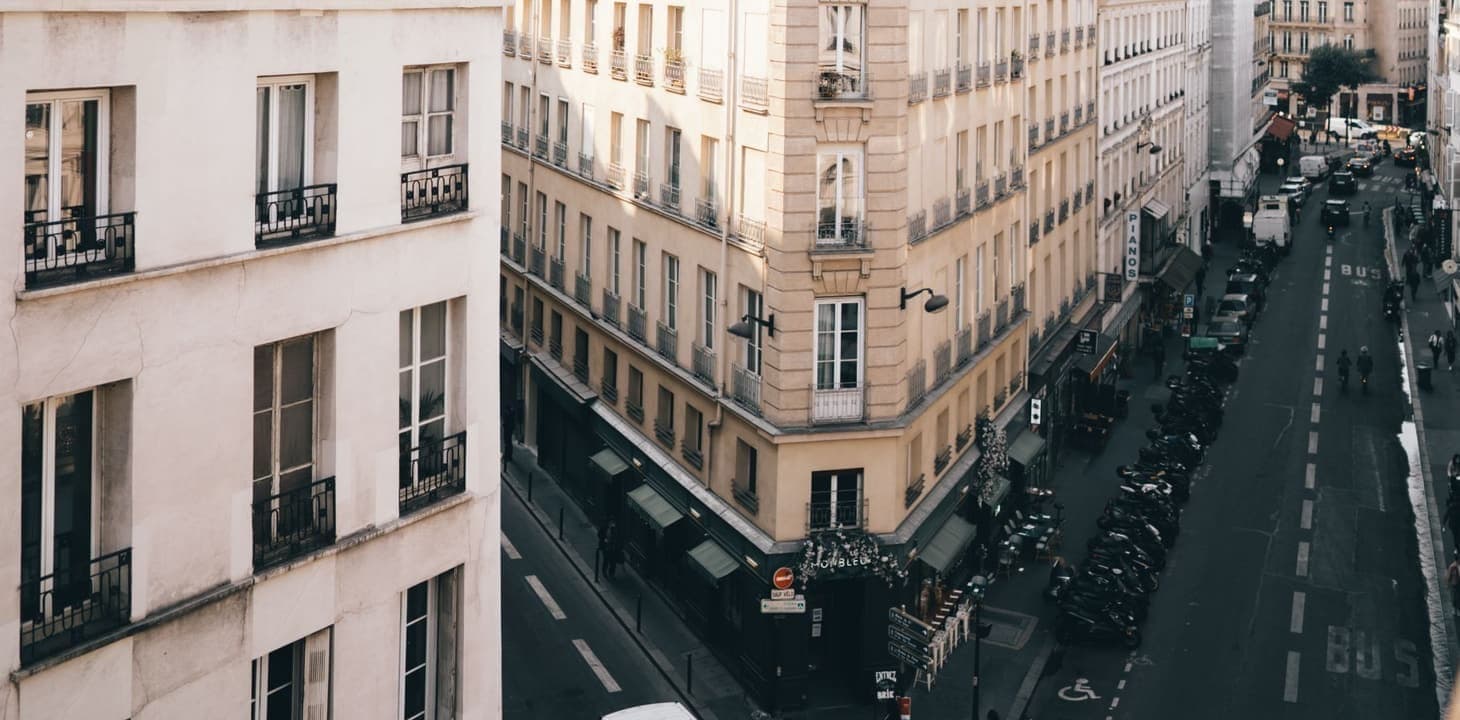 Haussmann buildings along a Paris street.